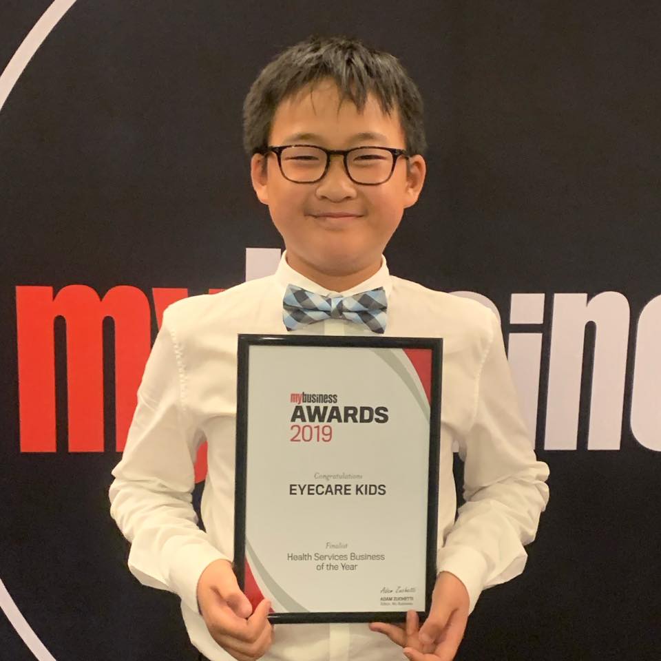 Max, the son of Eyecare Kids founder and optometrist Dr Soojin Nam, is proud to hold the certificate during awards night.